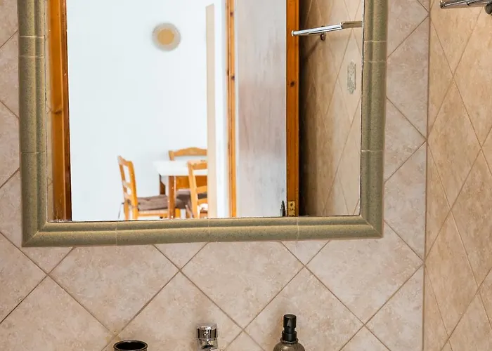 아파트호텔 Lefkos 리프코스칼파수